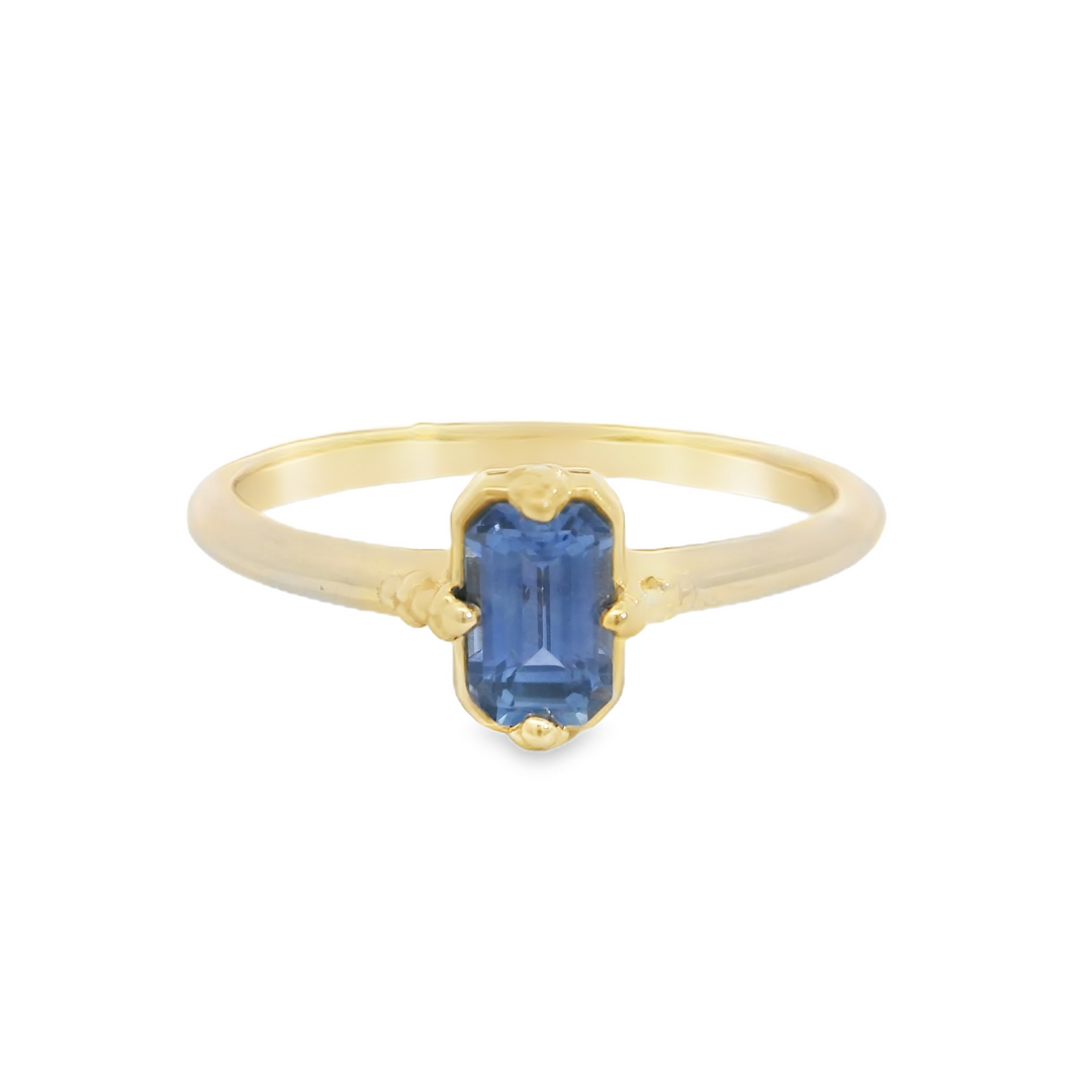 Marthaler Made 14K Yellow Gold Solitaire Gemstone Ring set with 1 Blue Emerald-Cut Sapphire total stone weight measures 0.47 ctw.