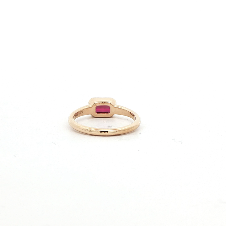 Marthaler Made 14K Yellow Gold East to West Bezel Ring with 1 Emerald Cut Ruby, 1.06 ct
