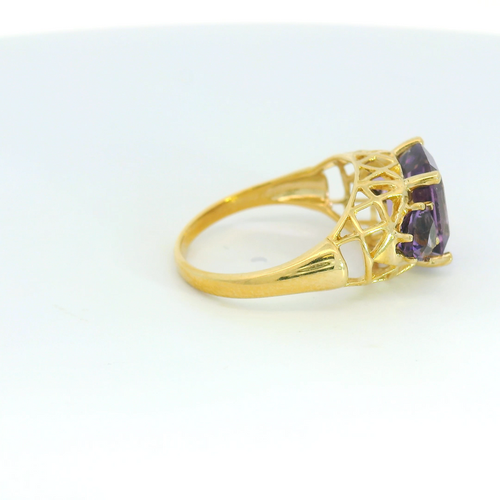 Estate 14K Yellow Gold Three Stone Ring with 1 Emerald Cut Amethyst, 3.15 ct and 2 Trillion Amethysts, 0.84 ctw