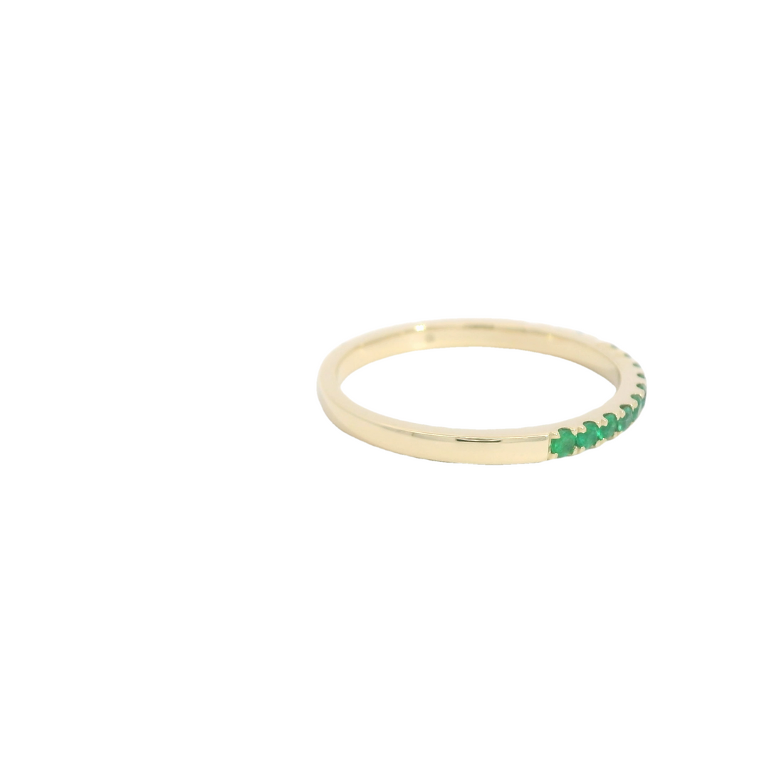 14K Yellow Gold Band Gemstone Ring set with 14 Emeralds total stone weight measures 0.22 ctw.