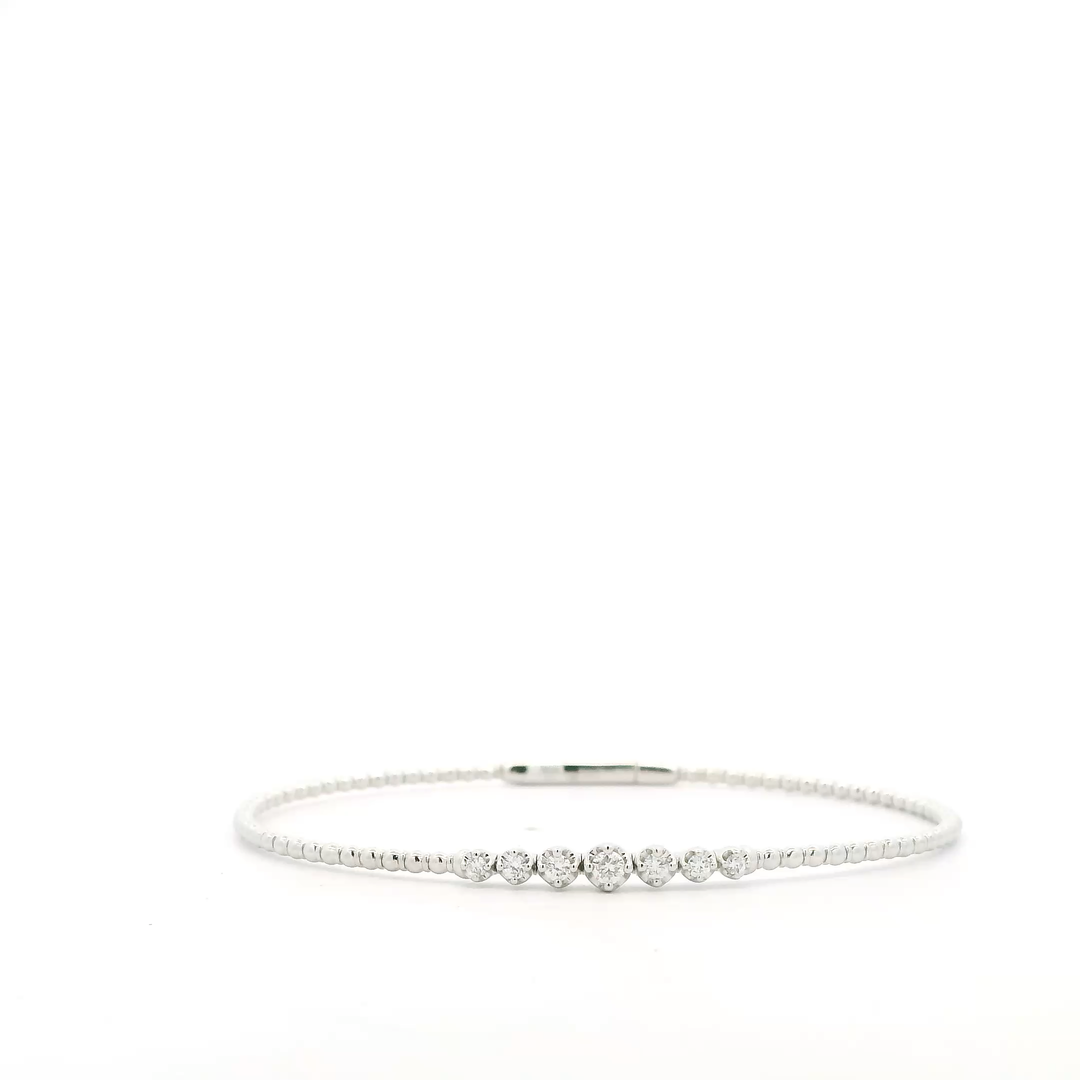 14K White Gold Flexible Bangle set with 7 Round Diamonds, 0.24 ctw