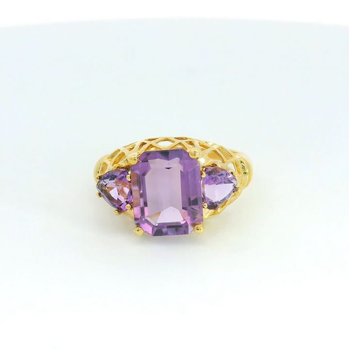 Estate 14K Yellow Gold Three Stone Ring with 1 Emerald Cut Amethyst, 3.15 ct and 2 Trillion Amethysts, 0.84 ctw
