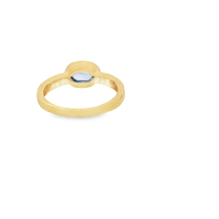 18K Yellow Gold Accented Gemstone Ring set with 1 Sapphire 0.82 ctw, and 16 Round G/H SI Diamonds, 0.14 ctw. total stone weight measures 0.96 ctw.