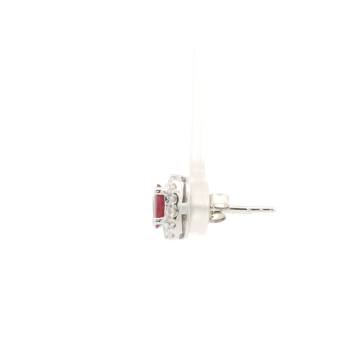 14K White Gold Stud Earrings set with 2 Oval Rubies, 1.45 ctw and 28 Round Diamonds, 0.33 ctw