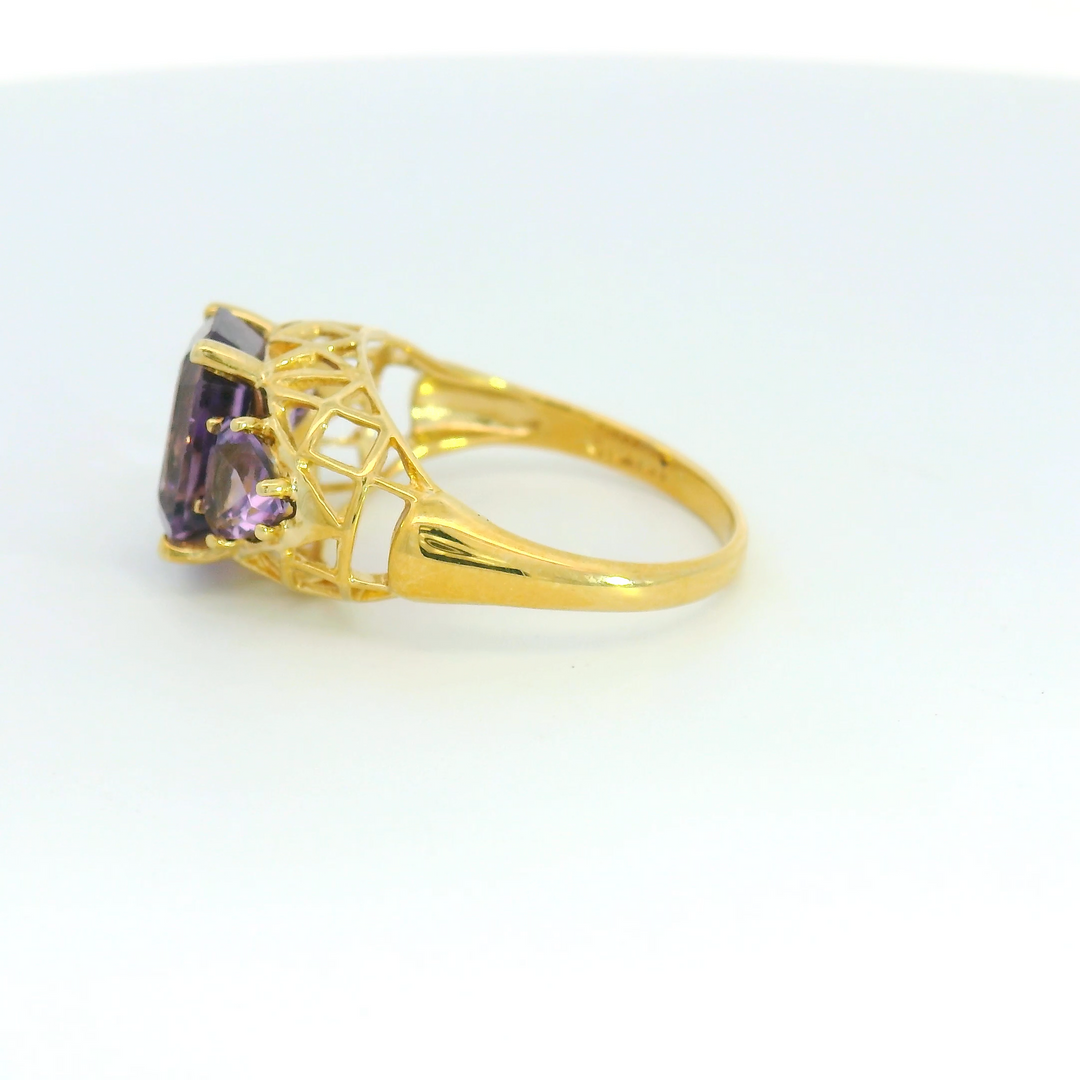 Estate 14K Yellow Gold Three Stone Ring with 1 Emerald Cut Amethyst, 3.15 ct and 2 Trillion Amethysts, 0.84 ctw