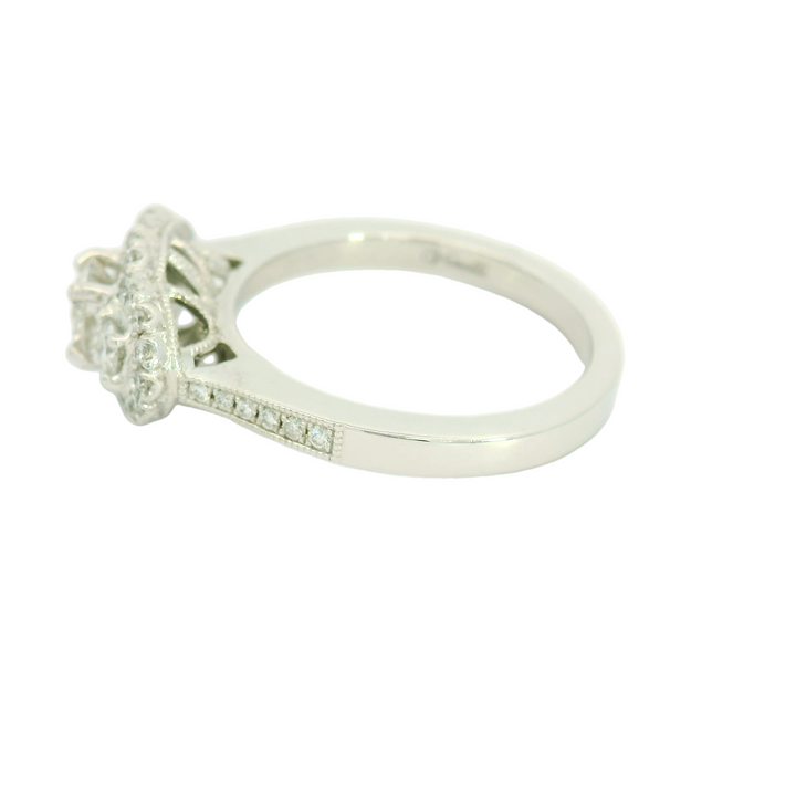 14K White Gold Three Stone Halo Engagement Ring set with 1 0.41 ct Round Diamond, G/H SI2, and 38 Round Diamonds, 0.35 ctw