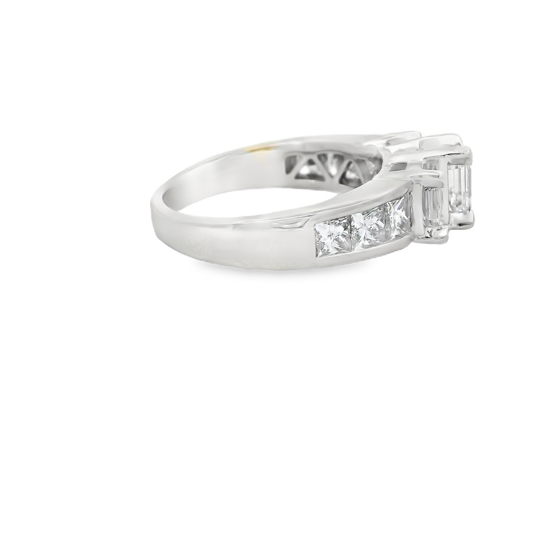Estate 14K White Gold Three Stone Engagement Ring set with 3 1.28 ct Emerald Cut Diamonds, F/G VS1 - VS2, and 6 Princess Cut Diamonds, 0.92 ctw