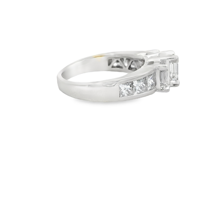 Estate 14K White Gold Three Stone Engagement Ring set with 3 1.28 ct Emerald Cut Diamonds, F/G VS1 - VS2, and 6 Princess Cut Diamonds, 0.92 ctw