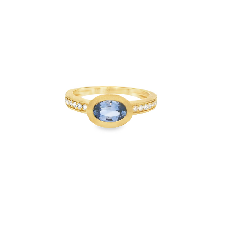 18K Yellow Gold Accented Gemstone Ring set with 1 Sapphire 0.82 ctw, and 16 Round G/H SI Diamonds, 0.14 ctw. total stone weight measures 0.96 ctw.