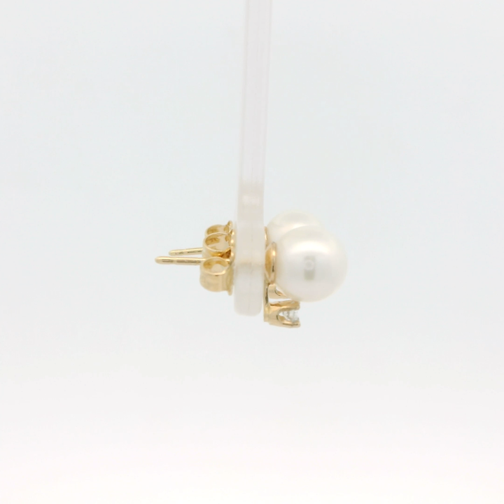 14K Yellow Gold Stud Earrings set with 2 Round 6.0 to 6.5 mm Akoya Pearls, 0.06 ctw Diamonds.