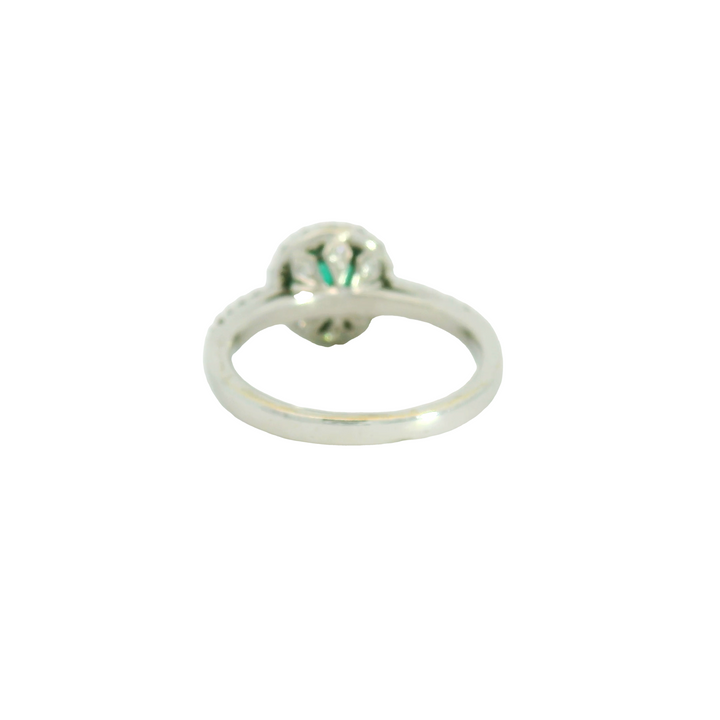 18K White Gold Estate Halo Gemstone Ring set with 1 Emerald, 0.50 ctw and 24 H/I, SI Diamonds 0.42 ctw,  total stone weight measures 0.92 ctw..