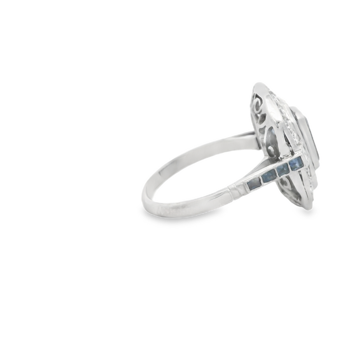 Platinum Estate Halo Gemstone Ring set with 1 Emerald Cut Aqua, 0.59 ctw, and 22 Round G/H, SI Diamonds, 0.70 ctw., and 28 French cut Sapphires, 0.84 ctw.,  total stone weight measures 2.13 ctw.