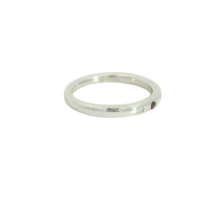 14K White Gold Band Gemstone Ring set with 3 Rubies, 0.09 ctw and 4 G/H SI Diamonds, 0.08 ctw,  total stone weight measures 0.17 ctw.