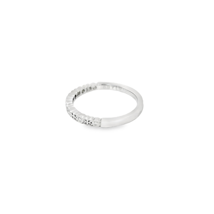 14K White Gold Bezel Set Anniversary Band set with 7 G/H SI1 - SI2 Diamonds total stone weight measures 0.08 ctw.