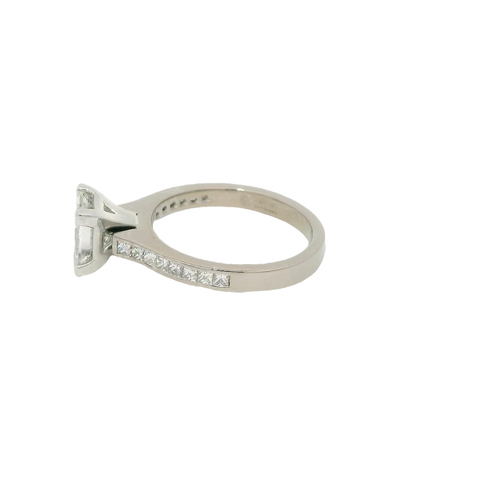 18KG White Gold 1.51ctw. Diamond Prong center and channel set side diamonds Engagement Ring