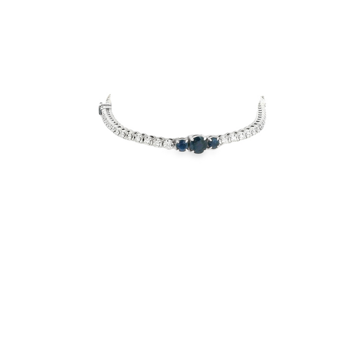 14K White Gold Line Bracelet set with 9 0.90 Ctw. Round Sapphires(s) Total stone weight for bracelet measures 1.38 ctw.
