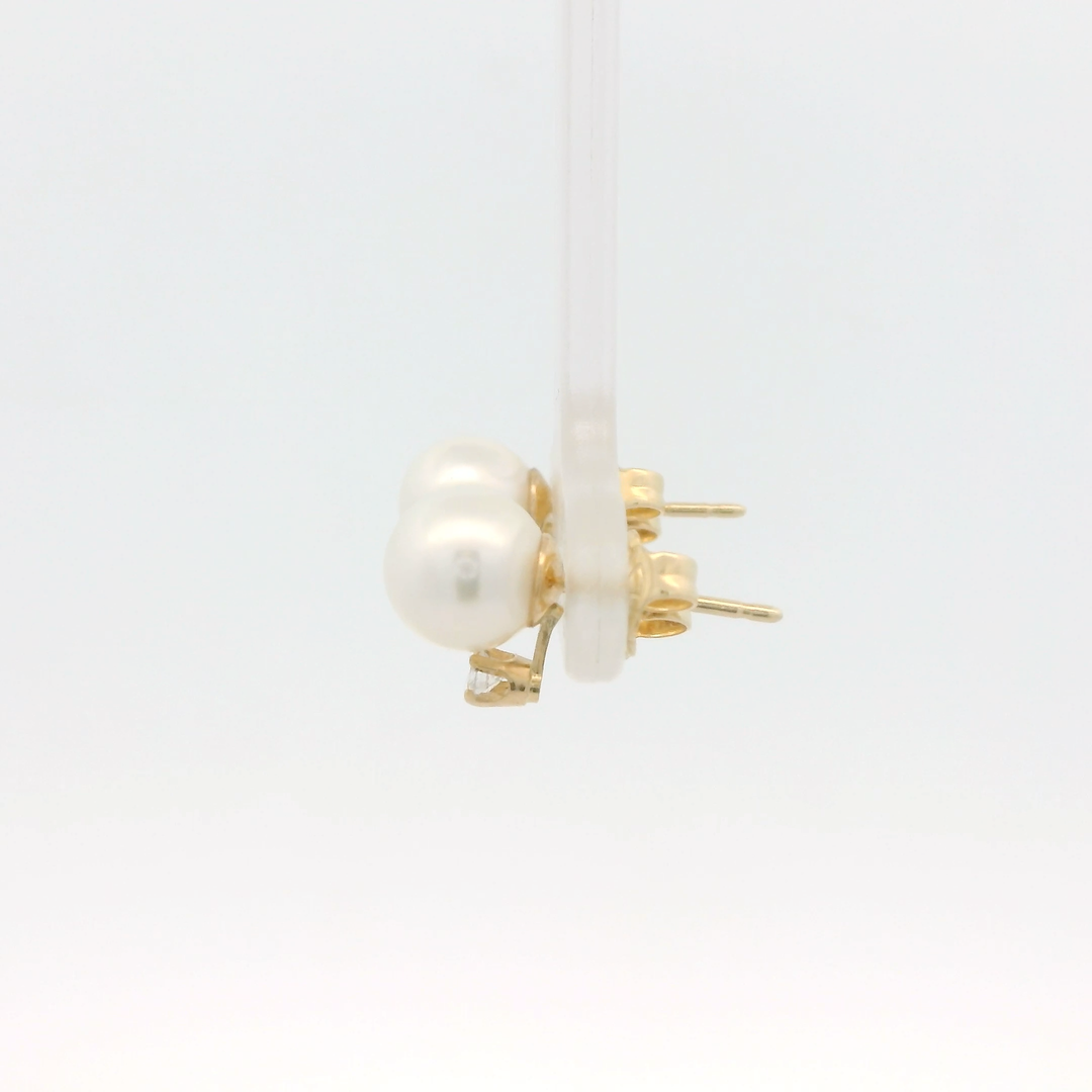 14K Yellow Gold Stud Earrings set with 2 Round 6.0 to 6.5 mm Akoya Pearls, 0.06 ctw Diamonds.