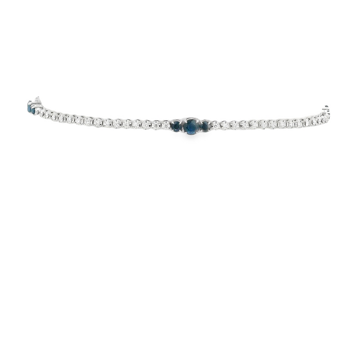 14K White Gold Line Bracelet set with 9 0.90 Ctw. Round Sapphires(s) Total stone weight for bracelet measures 1.38 ctw.