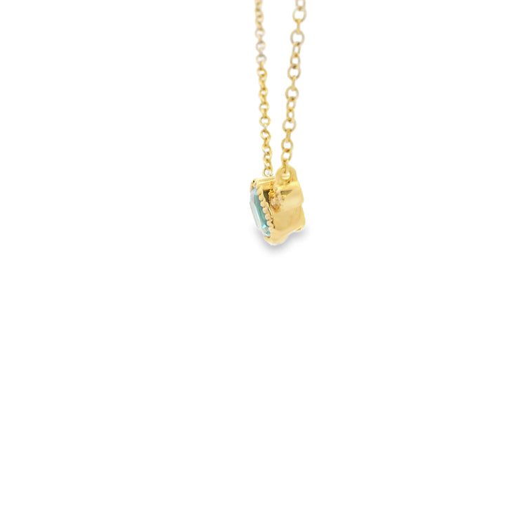 14K Yellow Gold Milgrain Bezel Pendant with 1 Cushion Blue Topaz, 0.60 ct and 2 Round Diamonds, 0.05 ctw on a 18 inch Cable Chain