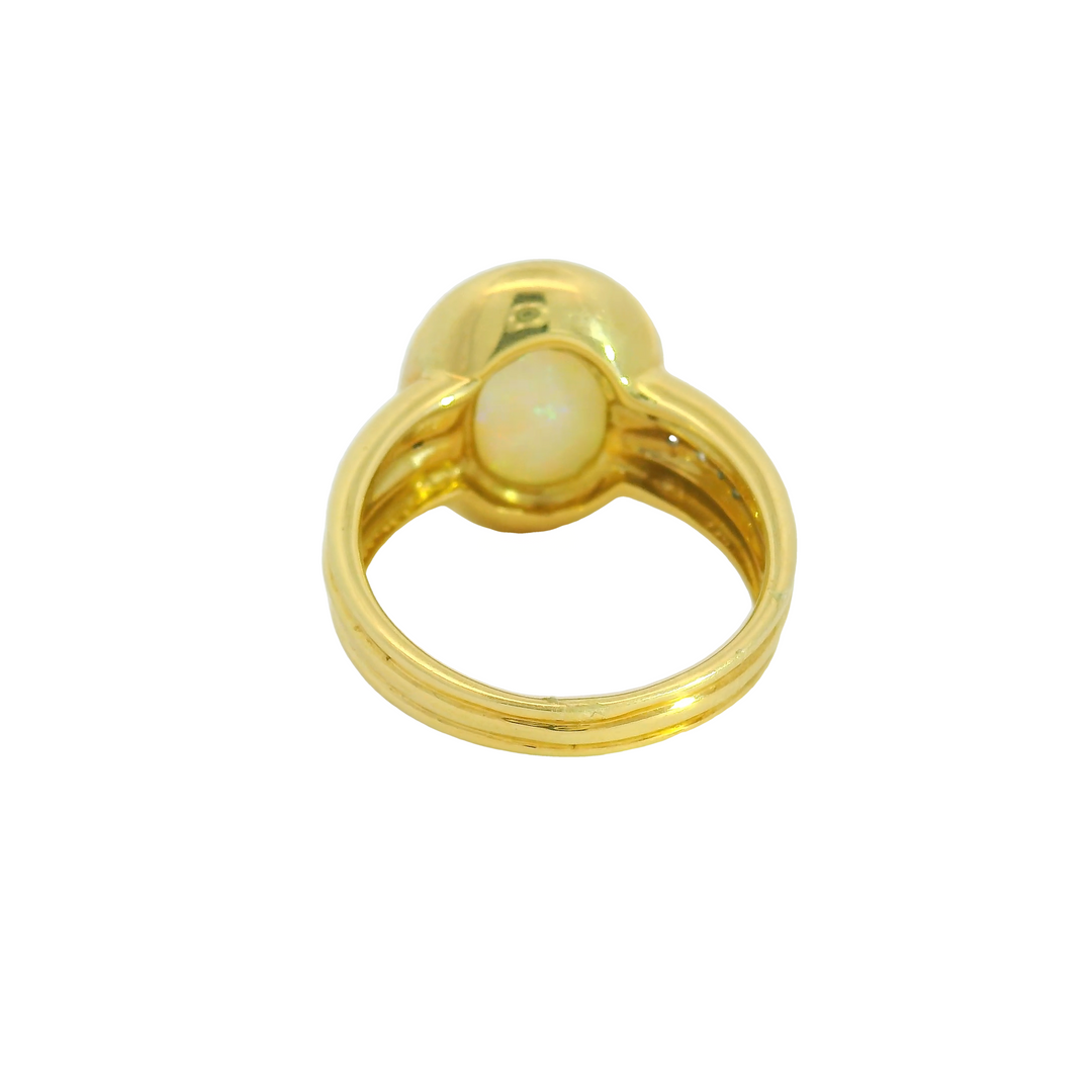 14K Yellow Gold Accented Gemstone Ring set with 1 Opal 4.40 ctw. and Diamonds 0.09 ctw.,   total stone weight measures 4.49 ctw.
