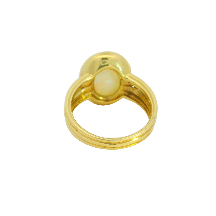 14K Yellow Gold Accented Gemstone Ring set with 1 Opal 4.40 ctw. and Diamonds 0.09 ctw.,   total stone weight measures 4.49 ctw.