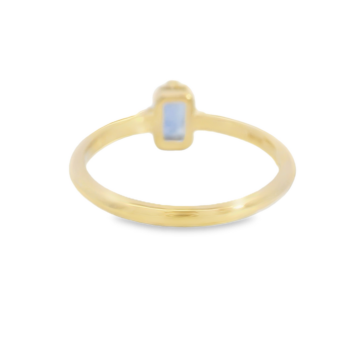 Marthaler Made 14K Yellow Gold Solitaire Gemstone Ring set with 1 Blue Emerald-Cut Sapphire total stone weight measures 0.47 ctw.