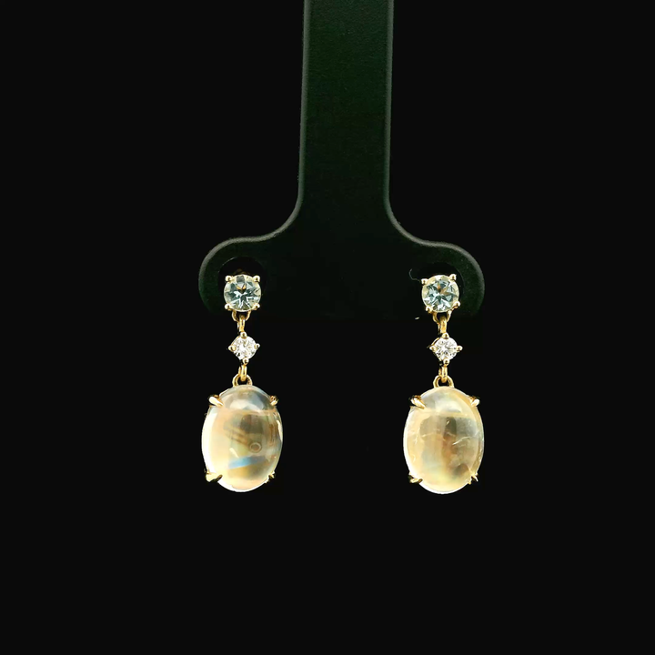 14K Yellow Gold Drop Earrings set with 2 Cabochon Moonstones, 3.53 ctw, 2 Round Diamonds, 0.06 ctw and 2 Round Aquamarines, 0.26 ctw