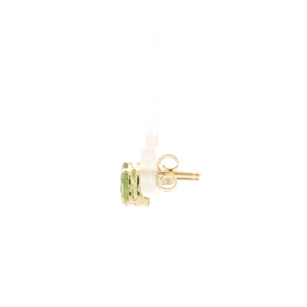 Estate 14K Yellow Gold Stud Earrings set with 2 Pear Peridot, approximately 1.50 ctw