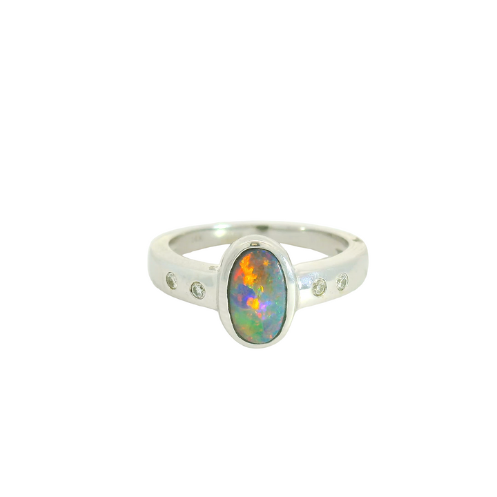 14K White Gold Accented Gemstone Ring set with 1 Opal 0.83 ctw and  4 G/H SI1 Diamonds total stone weight measures 0.89 ctw.