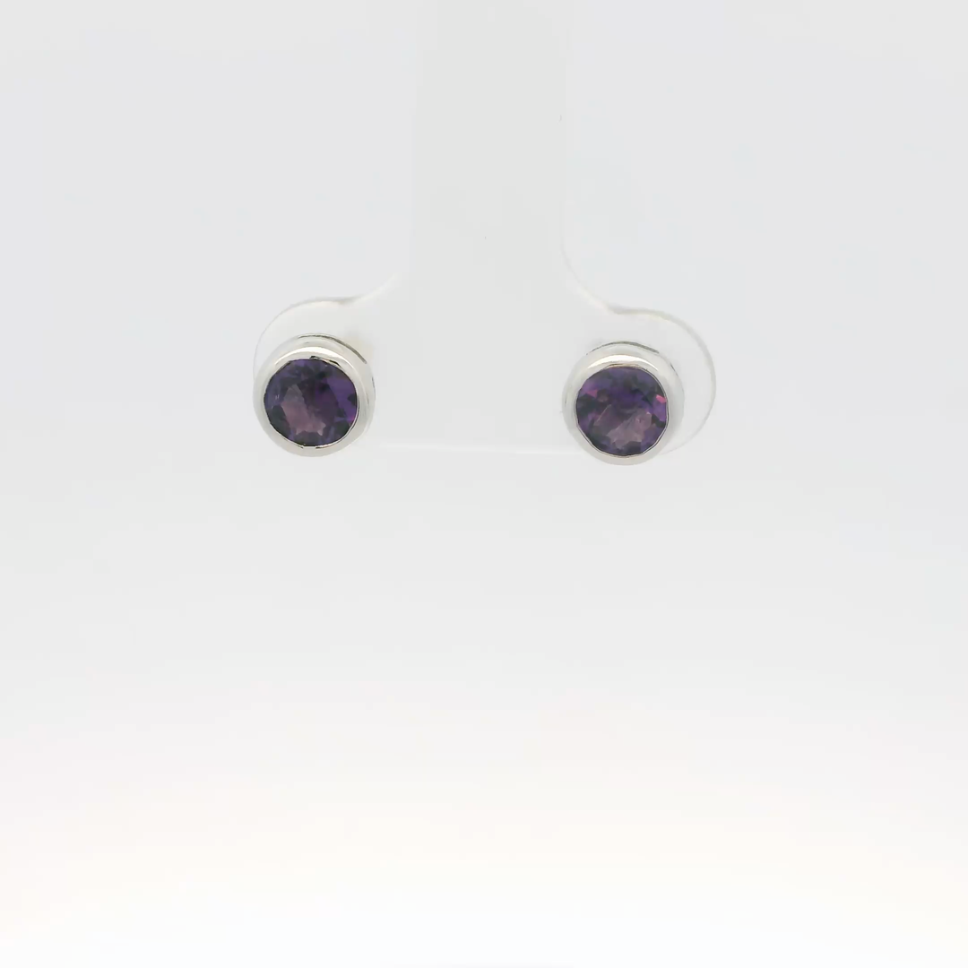 14K White Gold Stud Earrings set with 2 Round Amethysts, 1.25 ctw.