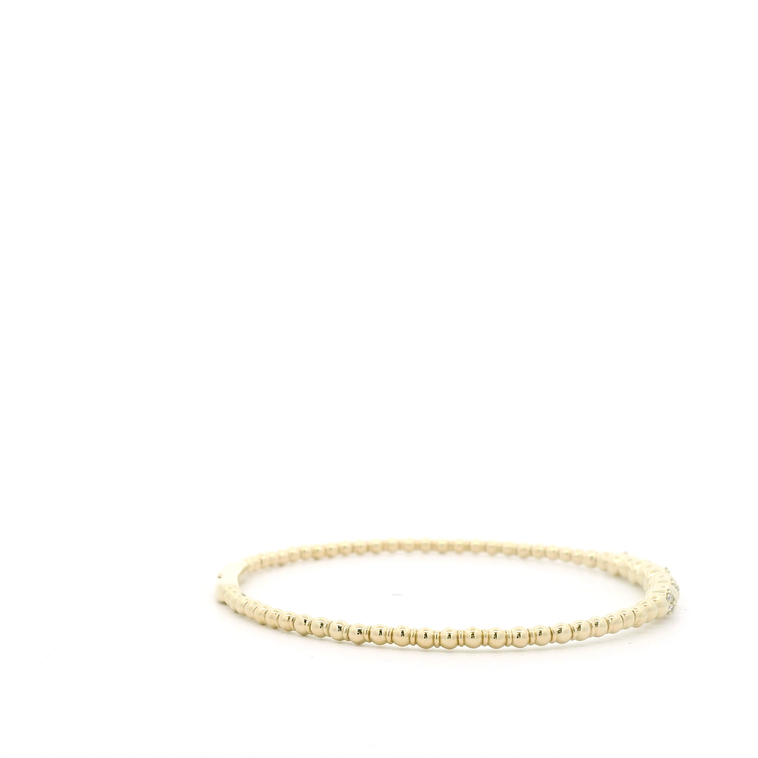14K Yellow Gold Flexible Bangle set with 35 Round Diamonds, 0.19 ctw