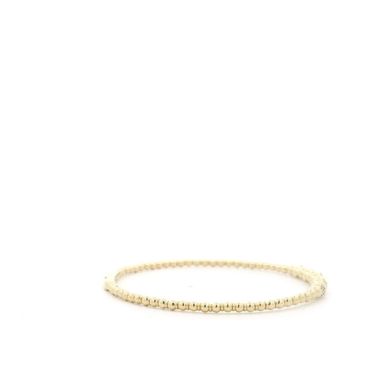 14K Yellow Gold Flexible Bangle set with 35 Round Diamonds, 0.19 ctw