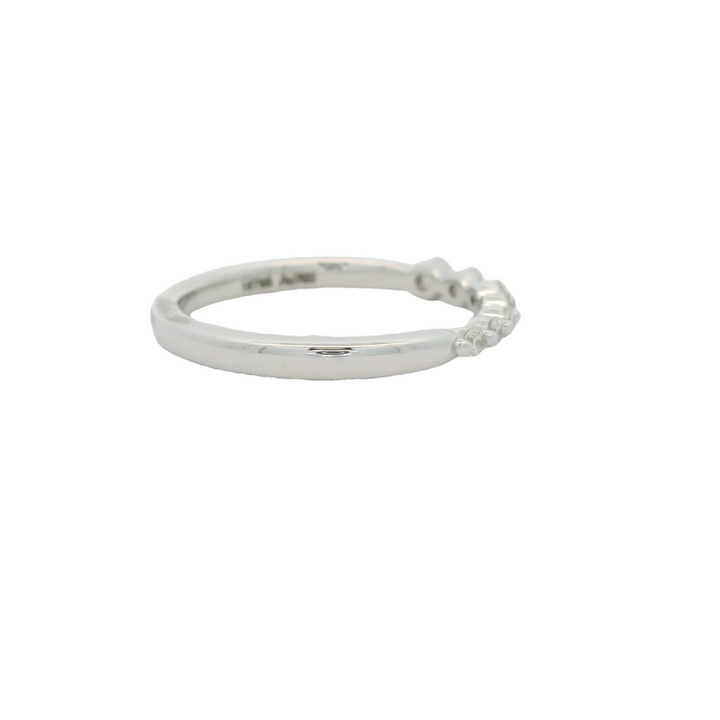 18K White Gold Stackable Anniversary Band set with 7 G/H SI1 Diamonds total stone weight measures 0.25 ctw.