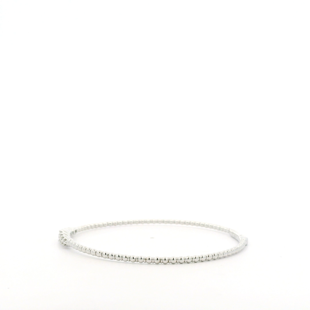 14K White Gold Flexible Bangle set with 7 Round Diamonds, 0.24 ctw