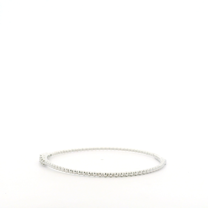 14K White Gold Flexible Bangle set with 7 Round Diamonds, 0.24 ctw