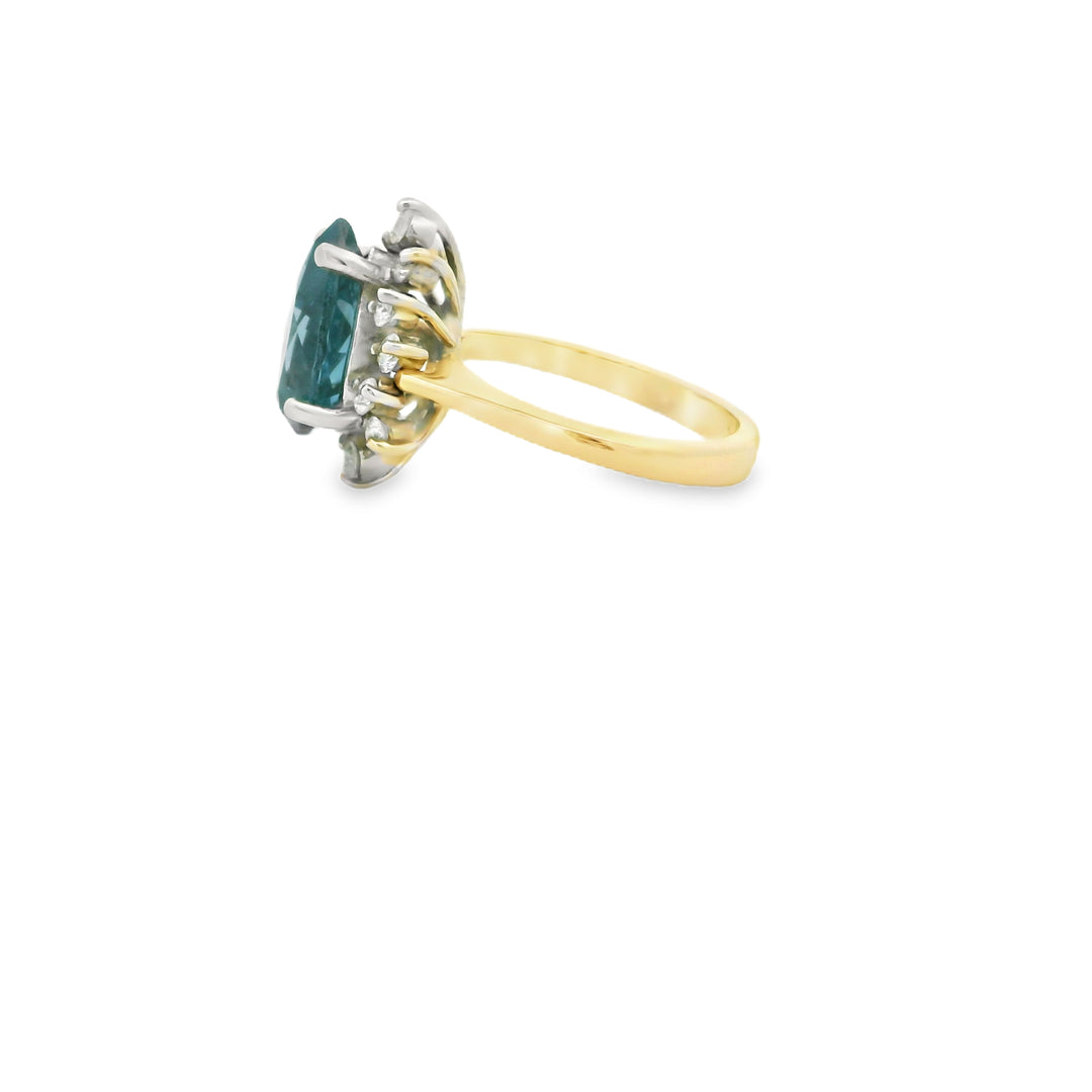 Estate 14K Two Tone Halo Gemstone Ring set with 1 Pear Blue Topaz, 3.29 ct and 14 Round Diamonds, 0.35 ctw