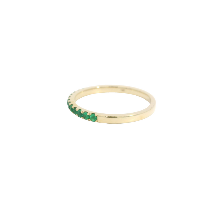 14K Yellow Gold Band Gemstone Ring set with 14 Emeralds total stone weight measures 0.22 ctw.