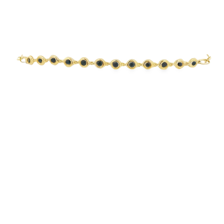 14K Yellow Gold Bezel, Paperclip Bracelet set with 12 0.52 Ctw. Round Sapphires(s) Total stone weight for bracelet measures 0.52 ctw.