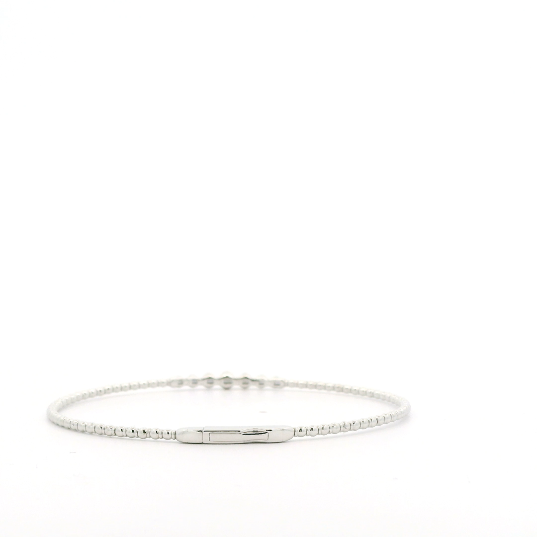 14K White Gold Flexible Bangle set with 7 Round Diamonds, 0.24 ctw