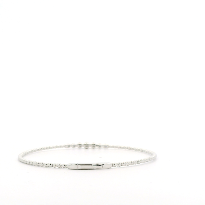 14K White Gold Flexible Bangle set with 7 Round Diamonds, 0.24 ctw
