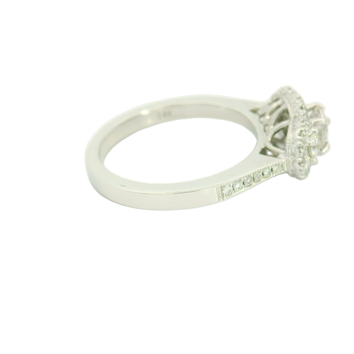 14K White Gold Three Stone Halo Engagement Ring set with 1 0.41 ct Round Diamond, G/H SI2, and 38 Round Diamonds, 0.35 ctw
