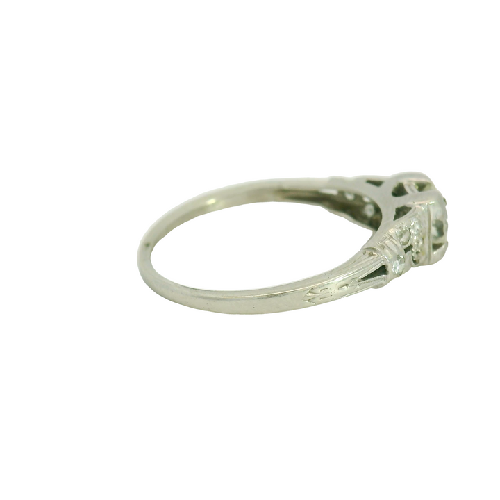 Estate Platinum Art Deco Engagement Ring set with 1 0.50 ct Round Diamond, H SI1, and 8 Round Diamonds, 0.15 ctw