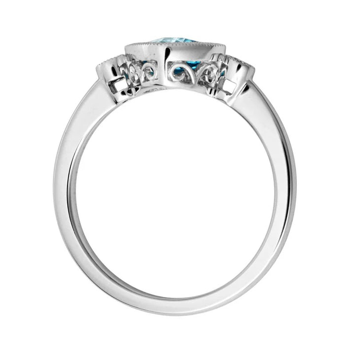 14K White Gold Three Stone Milgrain Bezel Ring set with 1 Cushion Aquamarine, 0.90 ct and 2 Round Diamonds, 0.05 ctw