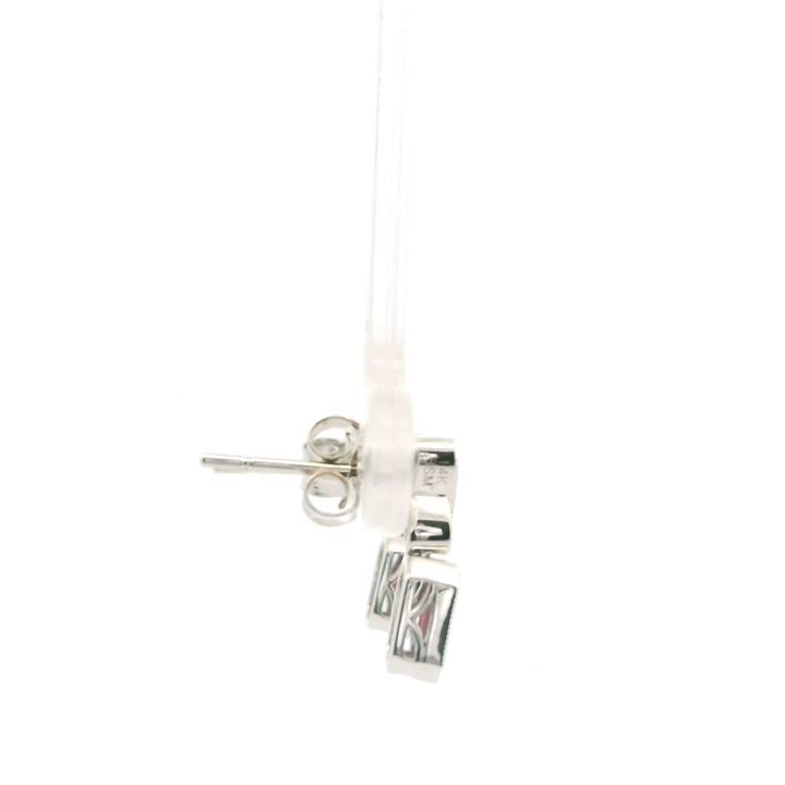 14K White Gold Drop Earrings set with 2 Oval Rubies, 0.58 ctw and 4 Round Diamonds, 0.05 ctw