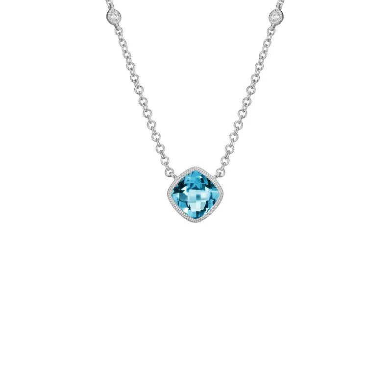 14K White Gold Milgrain Bezel Pendant with 1 Cushion Blue Topaz, 1.10 ct and 2 Round Diamonds, 0.03 ctw on a 16-18 Cable Chain