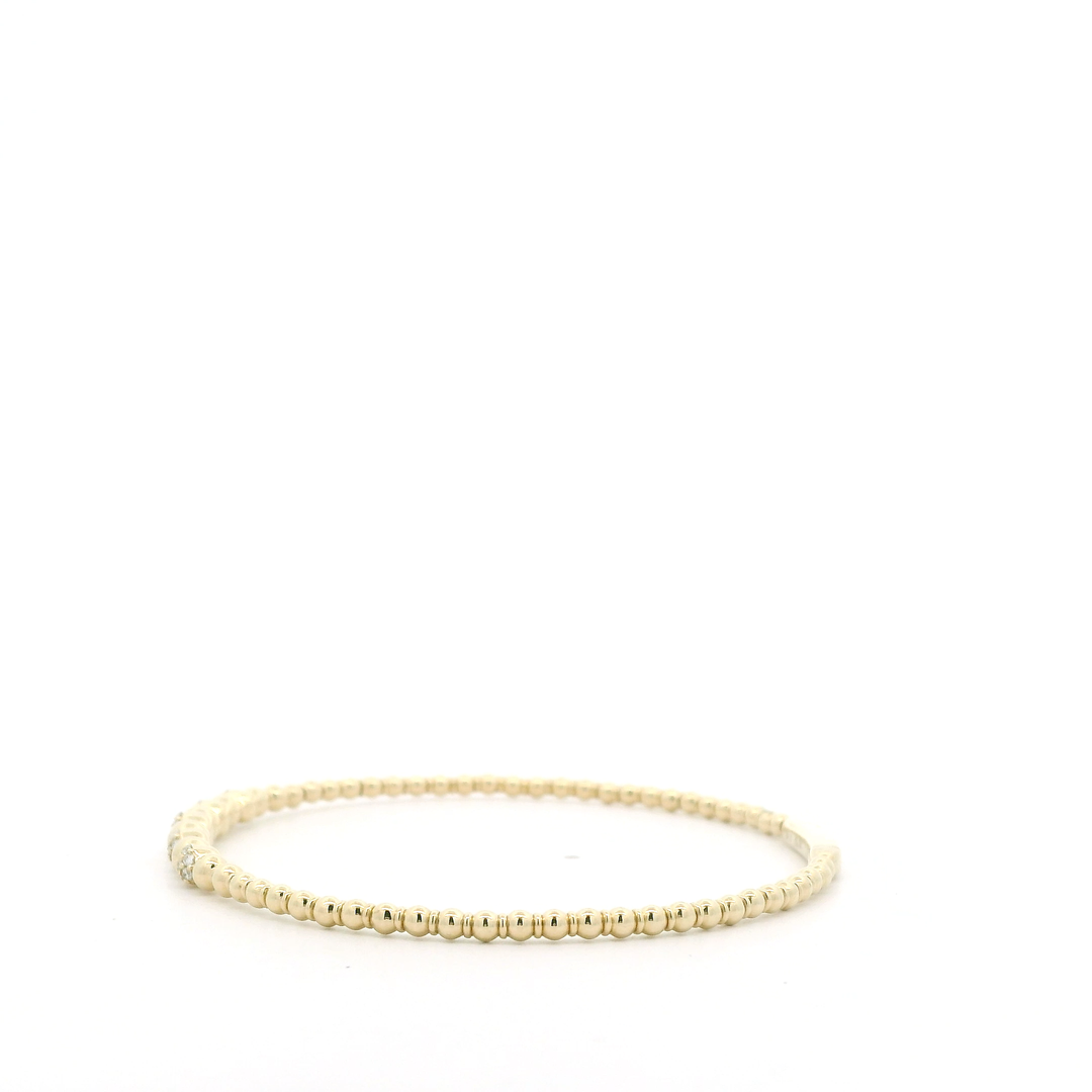 14K Yellow Gold Flexible Bangle set with 35 Round Diamonds, 0.19 ctw