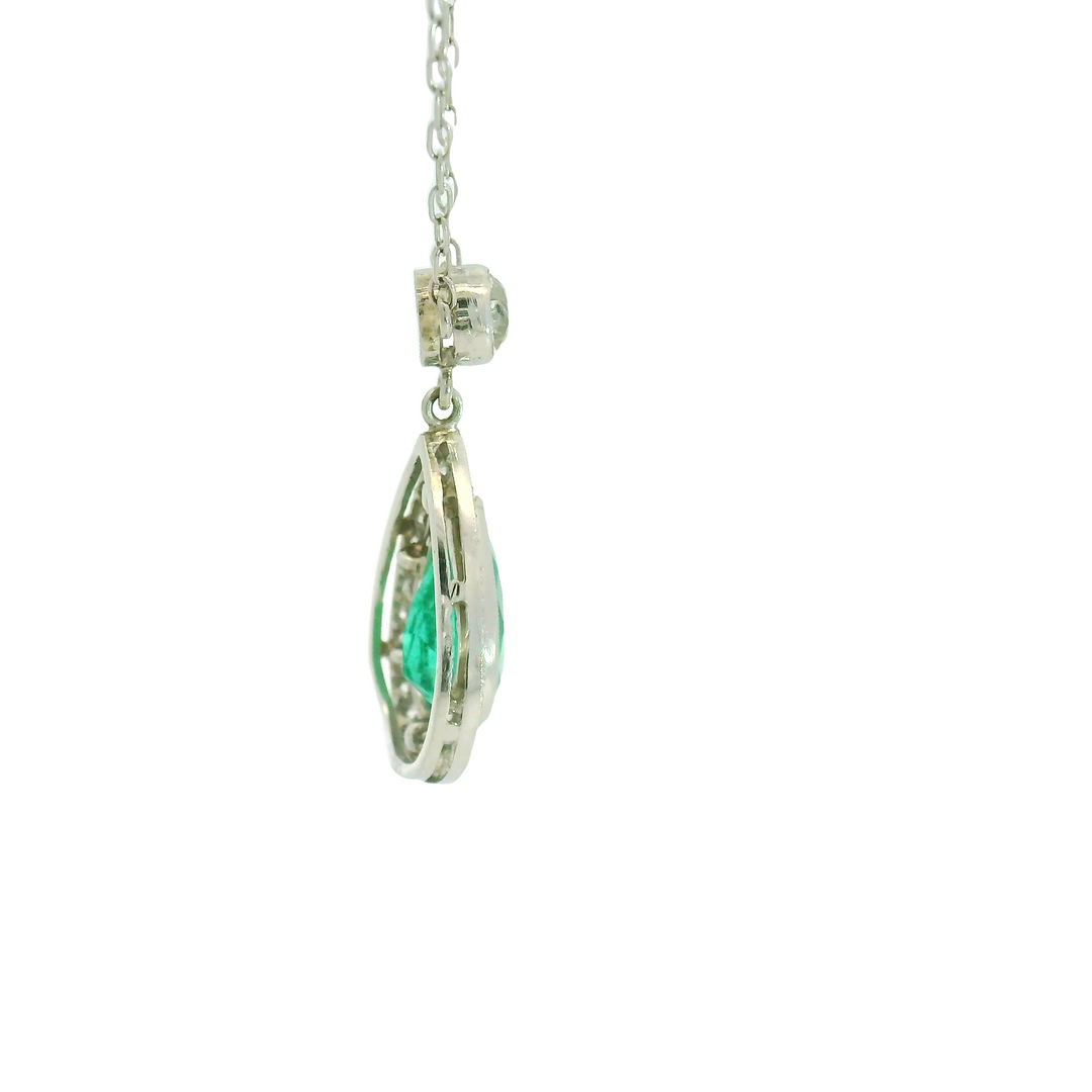 Platinum White Gold Estate Emerald Halo style Gemstone Pendant on a chain