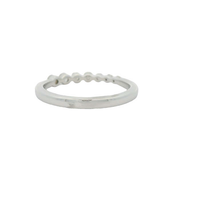 18K White Gold Stackable Anniversary Band set with 7 G/H SI1 Diamonds total stone weight measures 0.25 ctw.