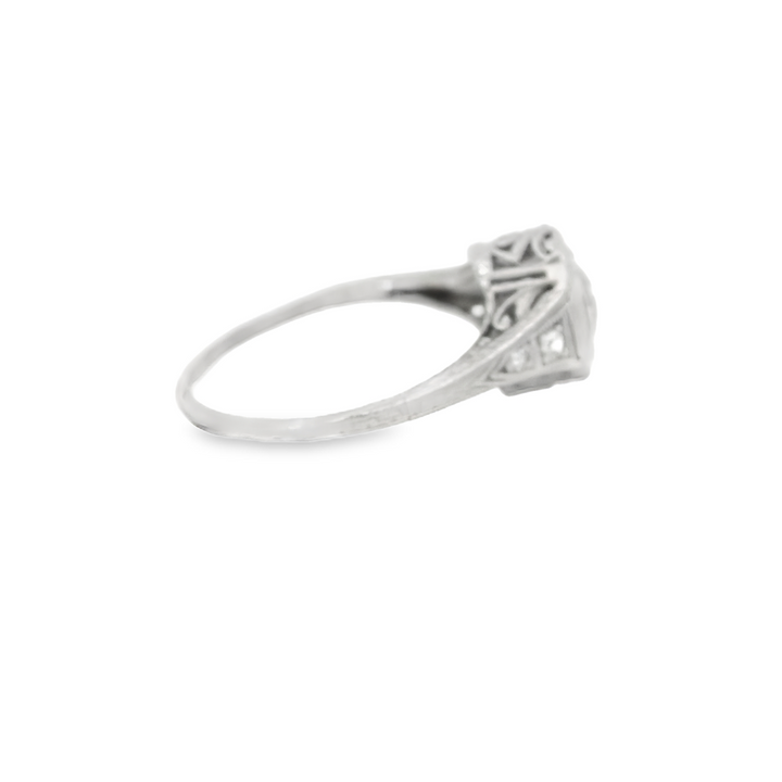 Platinum Estate Filigree, Solitaire Engagement Rings set with 1 H/I SI1 0.62 Ct. Round Diamond center stone, Total diamond weight for ring measures 0.67 ctw.