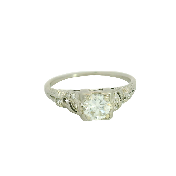 Estate Platinum Art Deco Engagement Ring set with 1 0.50 ct Round Diamond, H SI1, and 8 Round Diamonds, 0.15 ctw